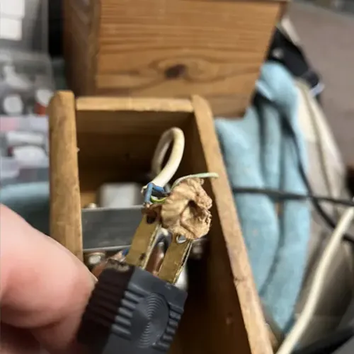 Broken wire with a plaster on it
