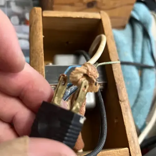 Broken wire with a plaster on it